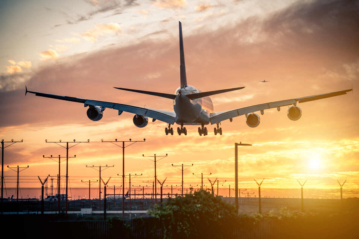 Cargo Airplane Landing On The Track